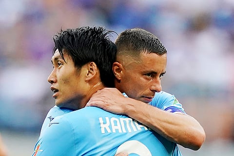 Lazio players celebrate scoring team's first goal
